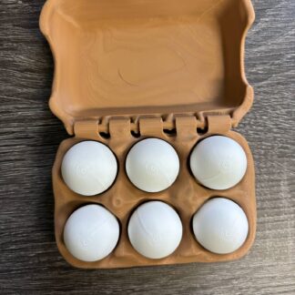 half dozen egg clicker